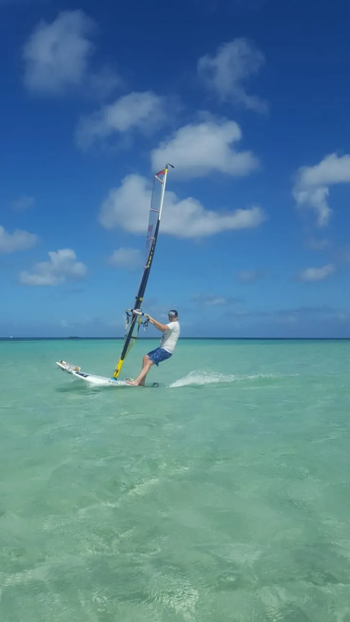 Windsurfing in Saipan's turquoise lagoon