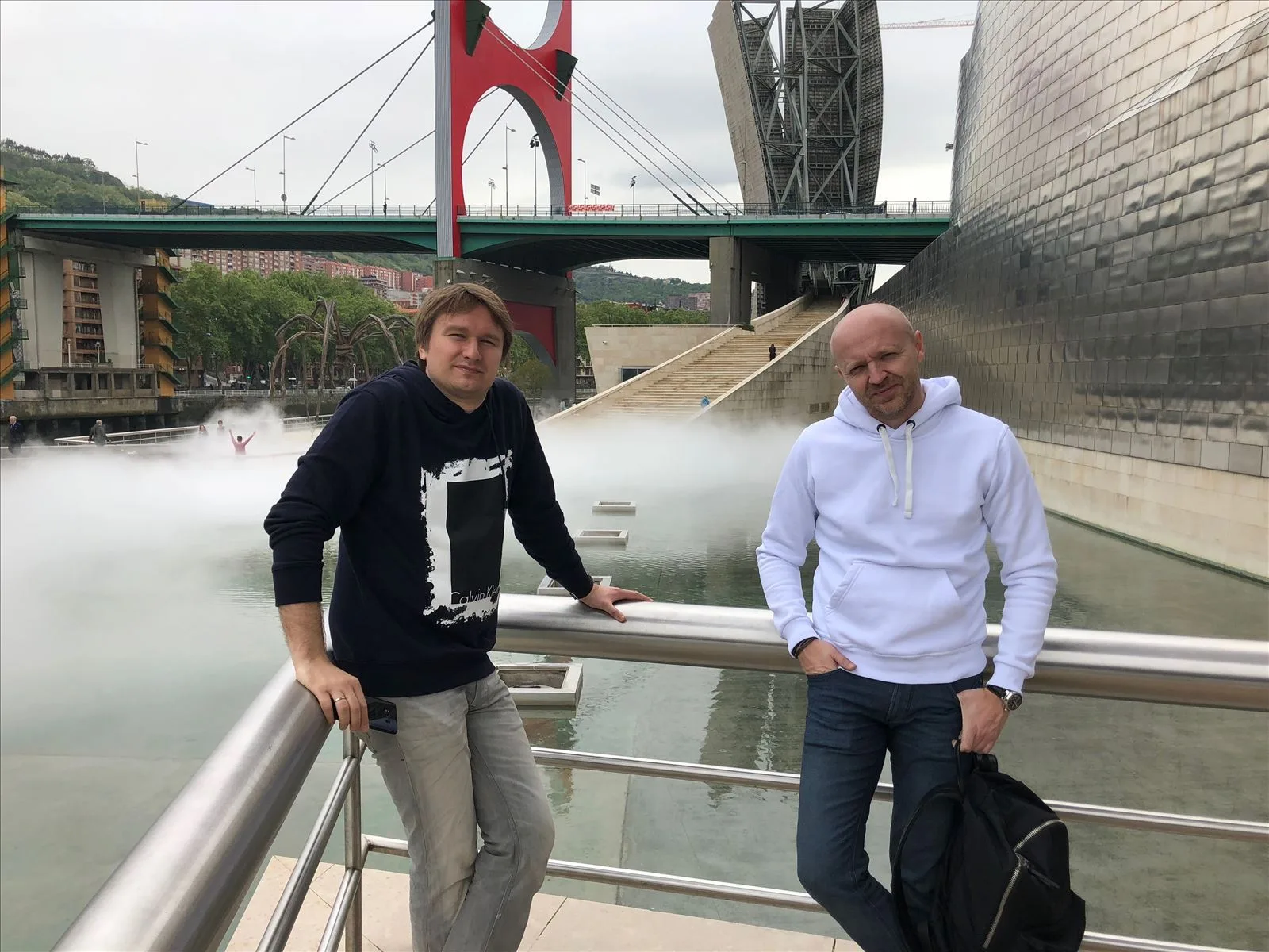 Tourists on a bridge near the Guggenheim