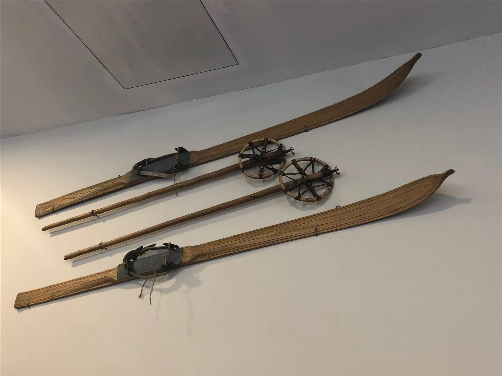 Ancient wooden skis on the wall