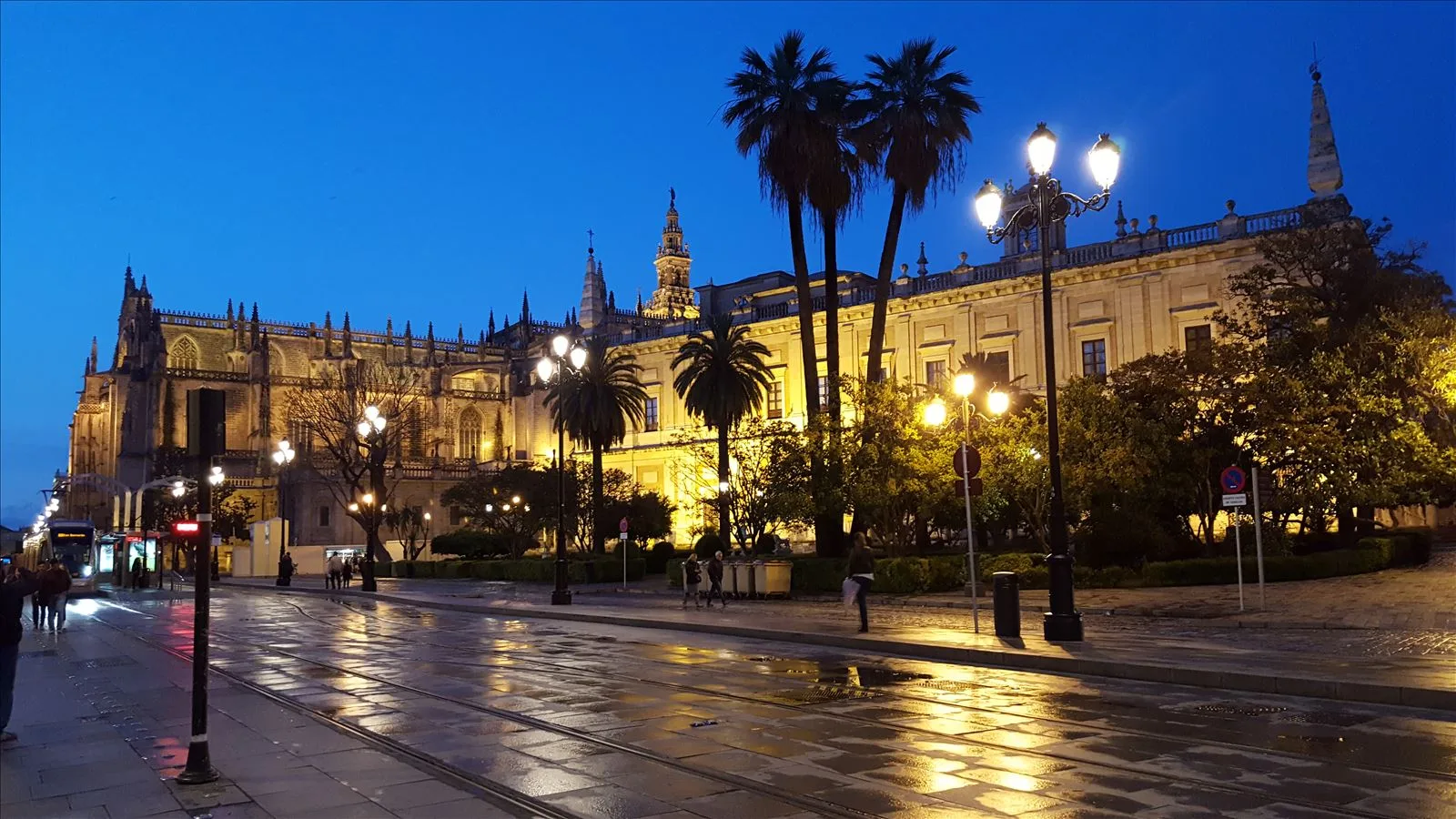Seville Cathedral and square at night