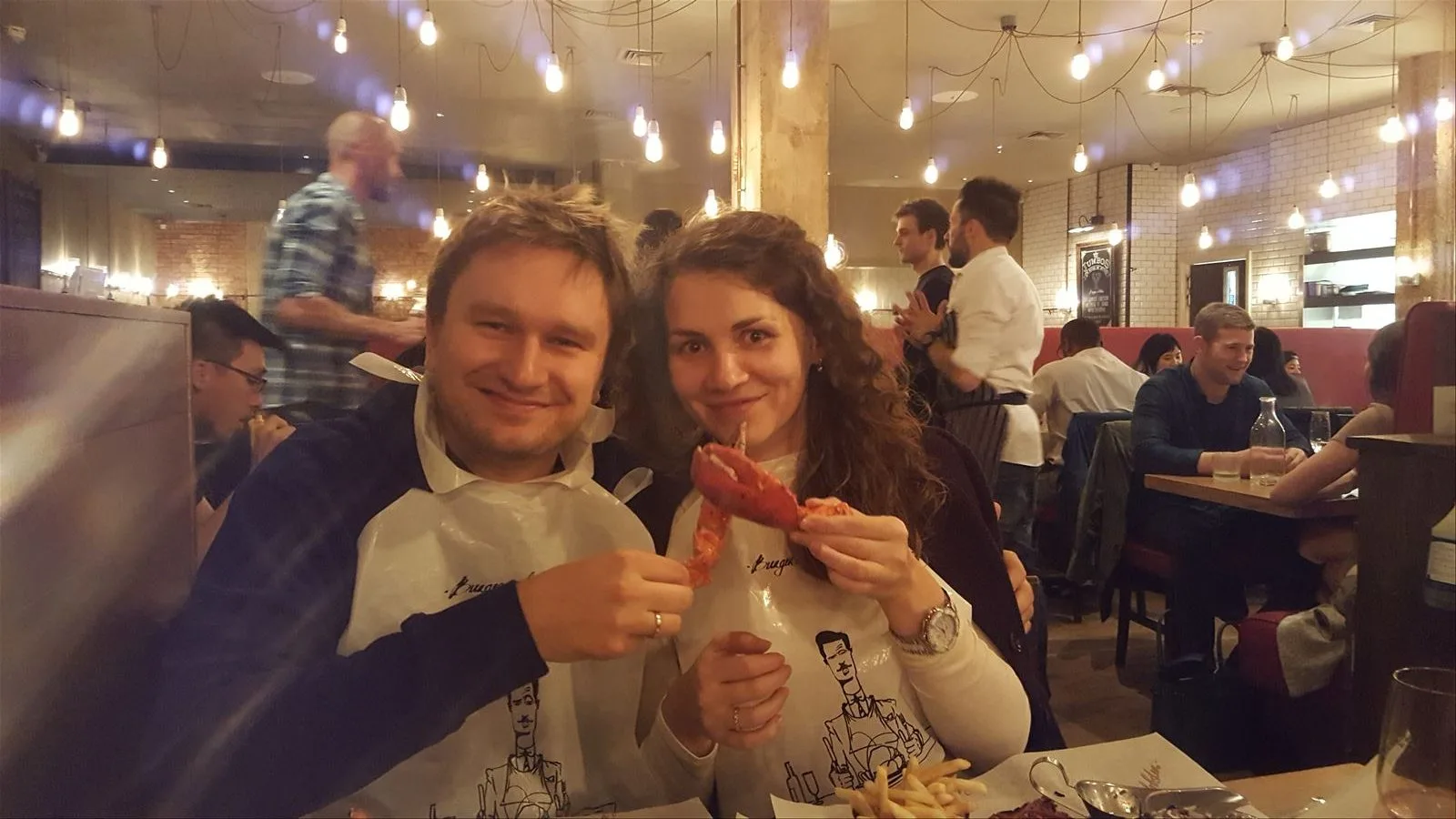 Couple with glasses in a London pub