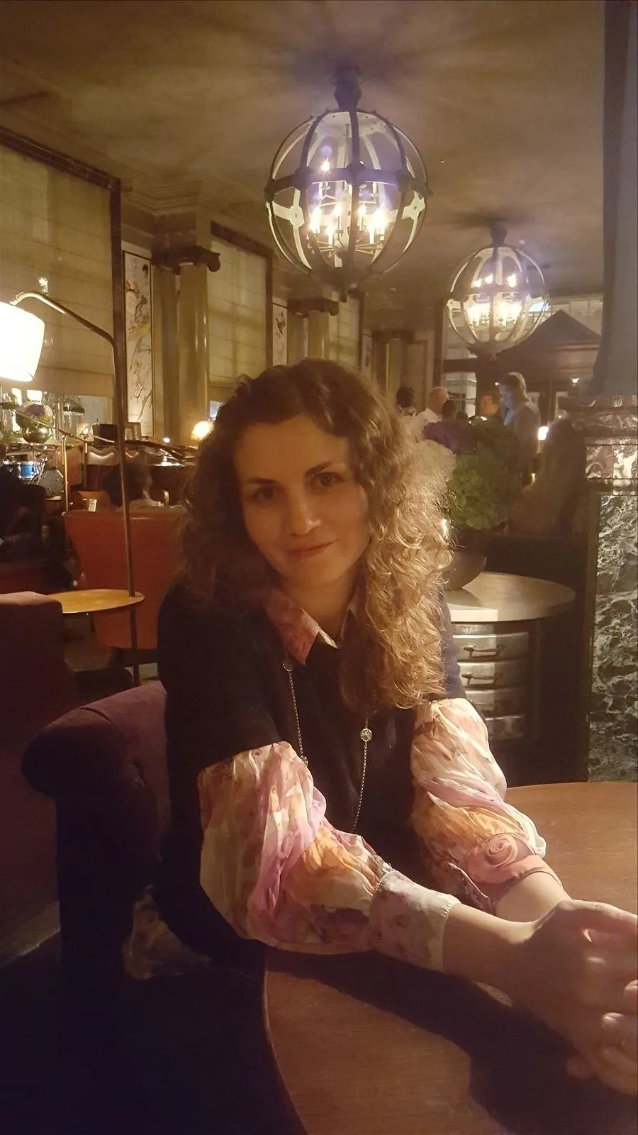 Girl with a cocktail in a London bar