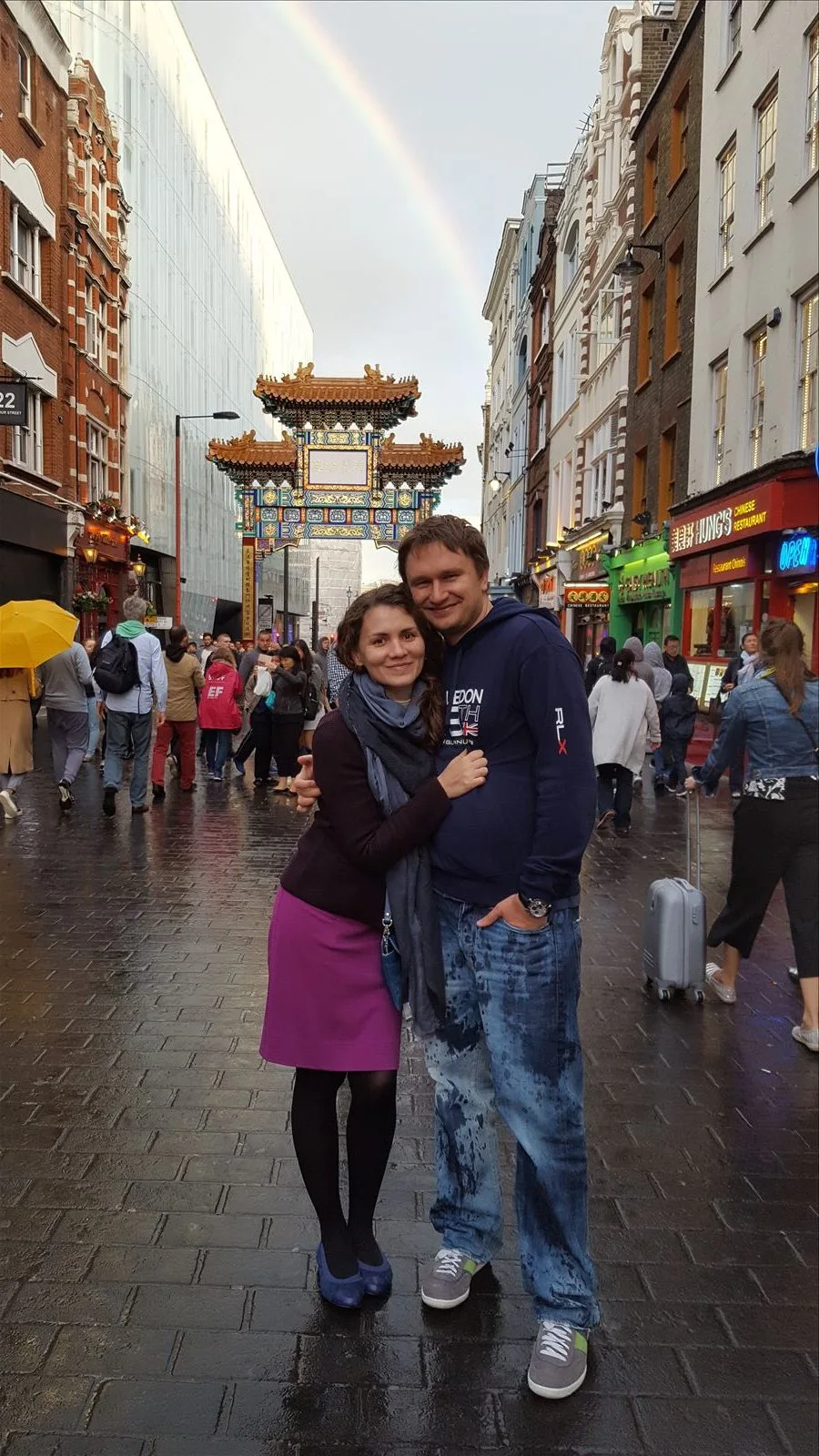 Couple against a rainy London backdrop