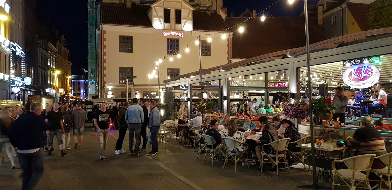 Summer cafe on Old Town street in Riga
