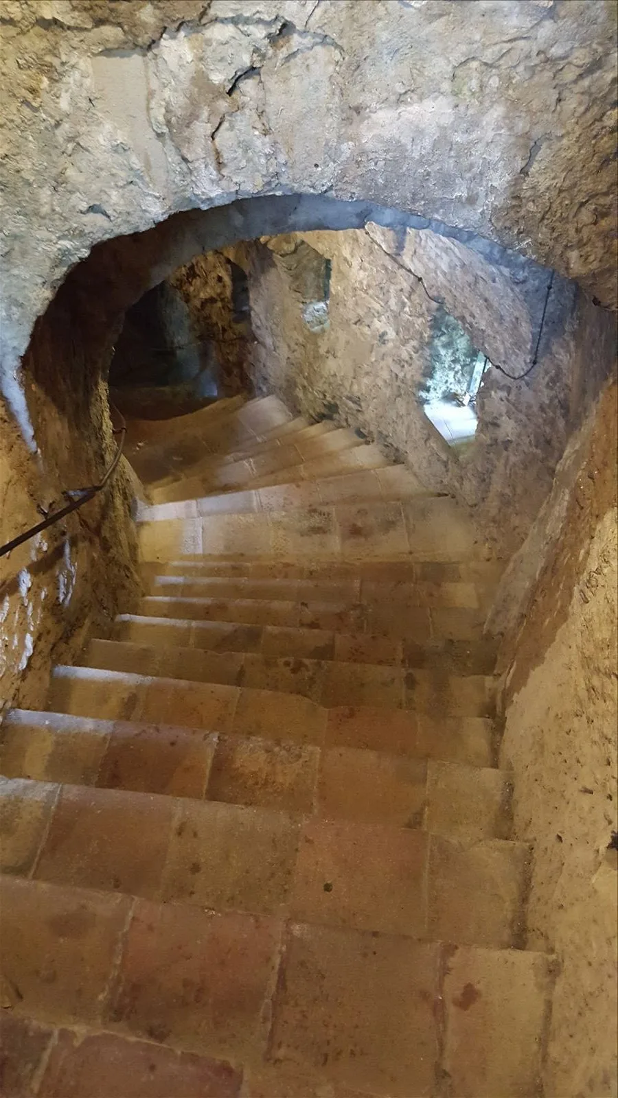 Stone staircase inside a rock in Ronda