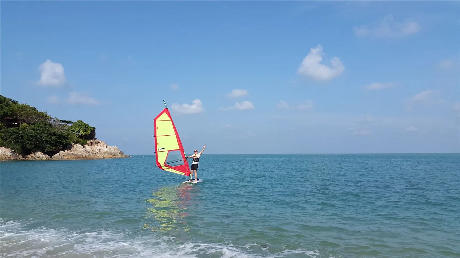 Windsurfing in blue sea near Samui
