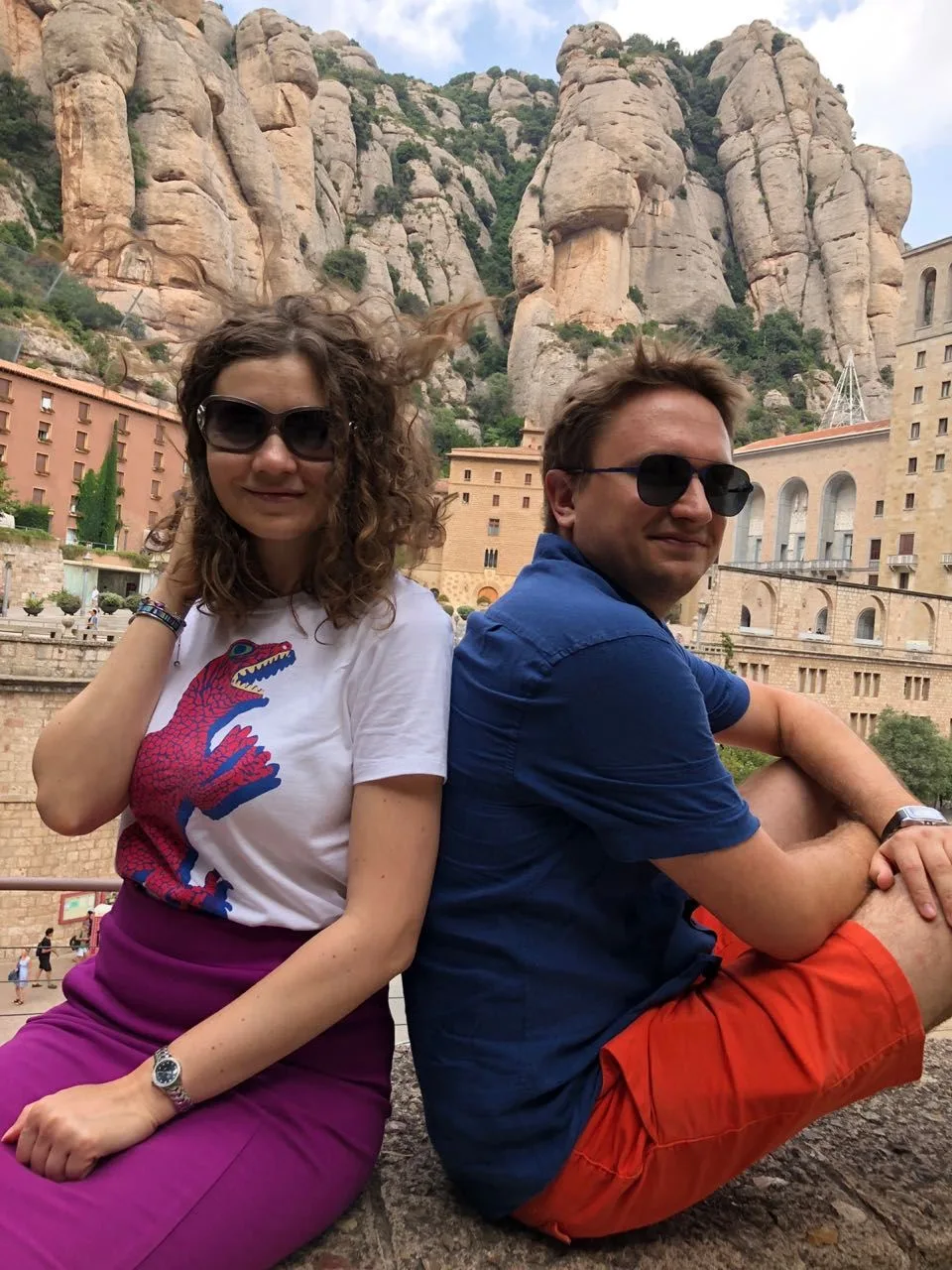 Couple of tourists with Montserrat mountain behind