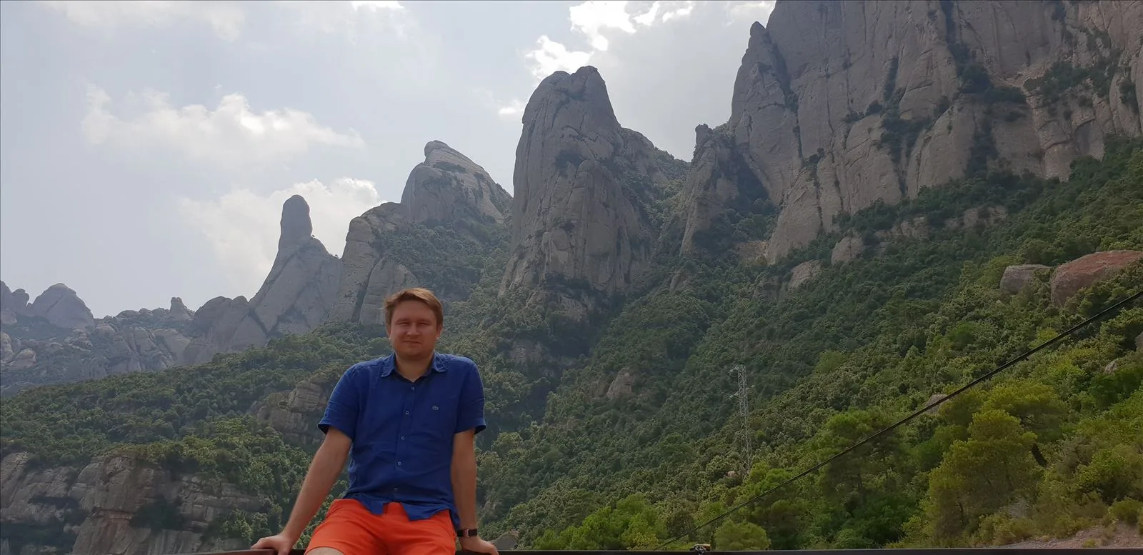 Montserrat cliffs with hiker in foreground
