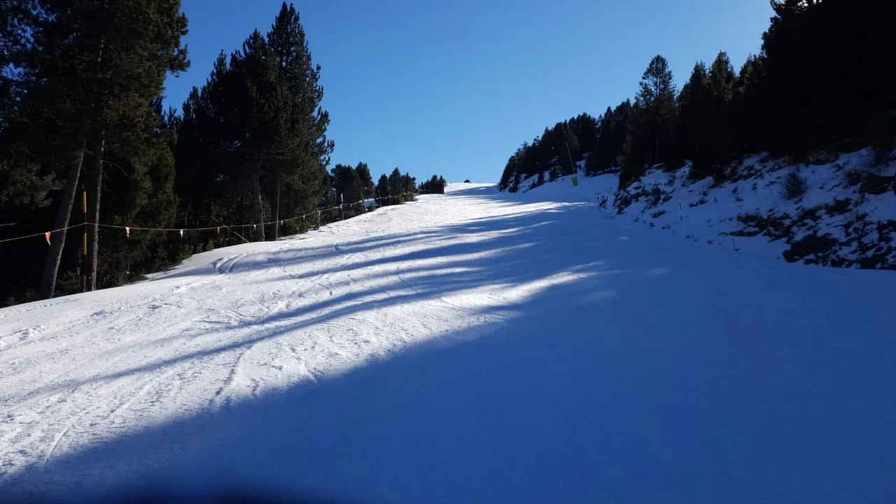 Snowy slope with shadows in Andorra