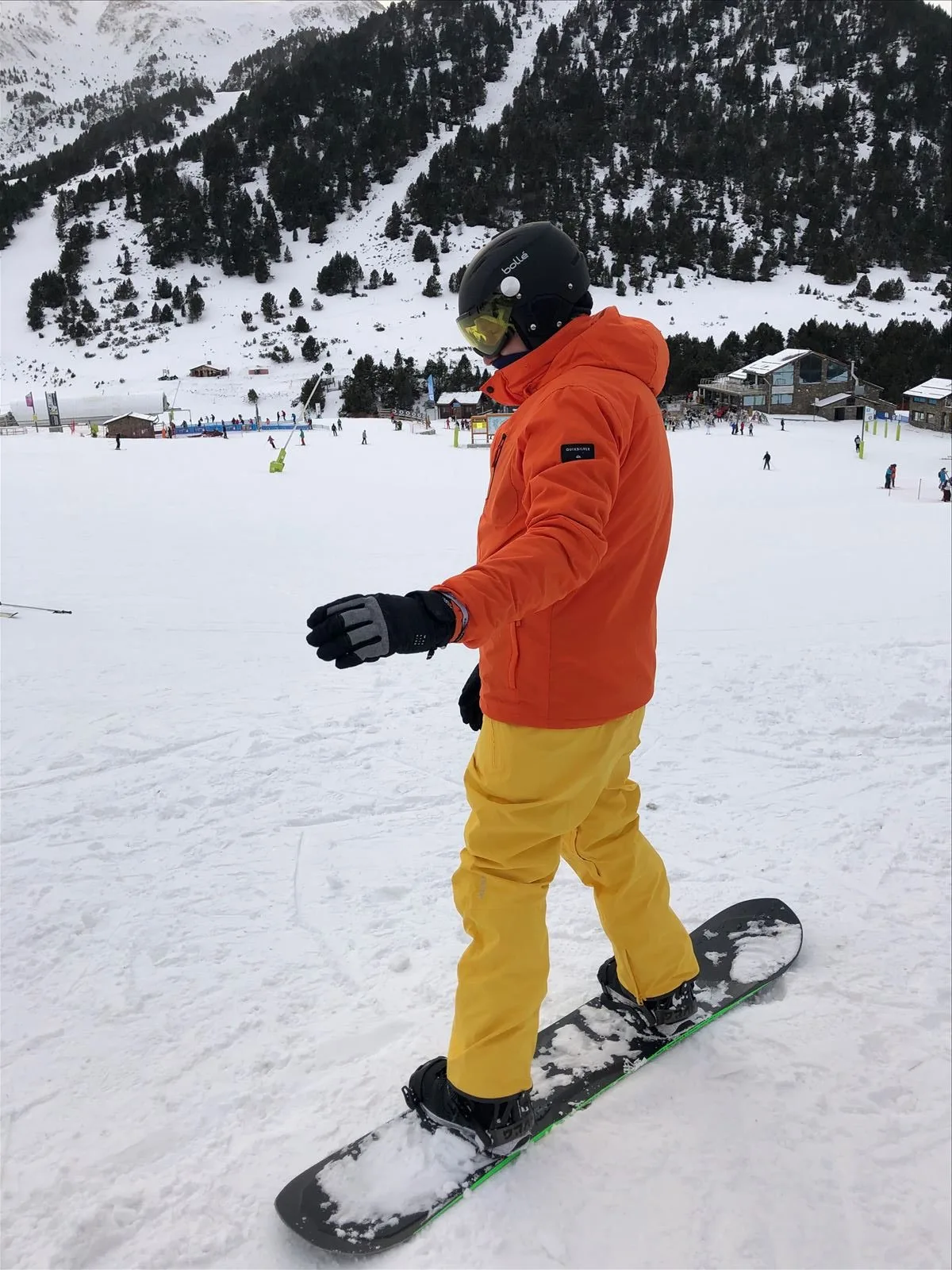 Skier in orange jacket in Andorra