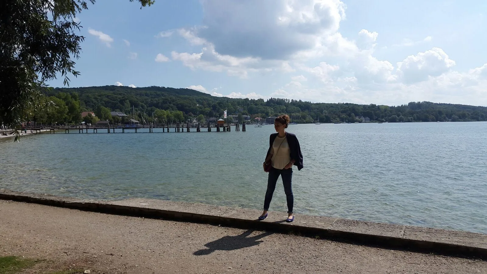 Tourist by a mountain lake in Bavaria