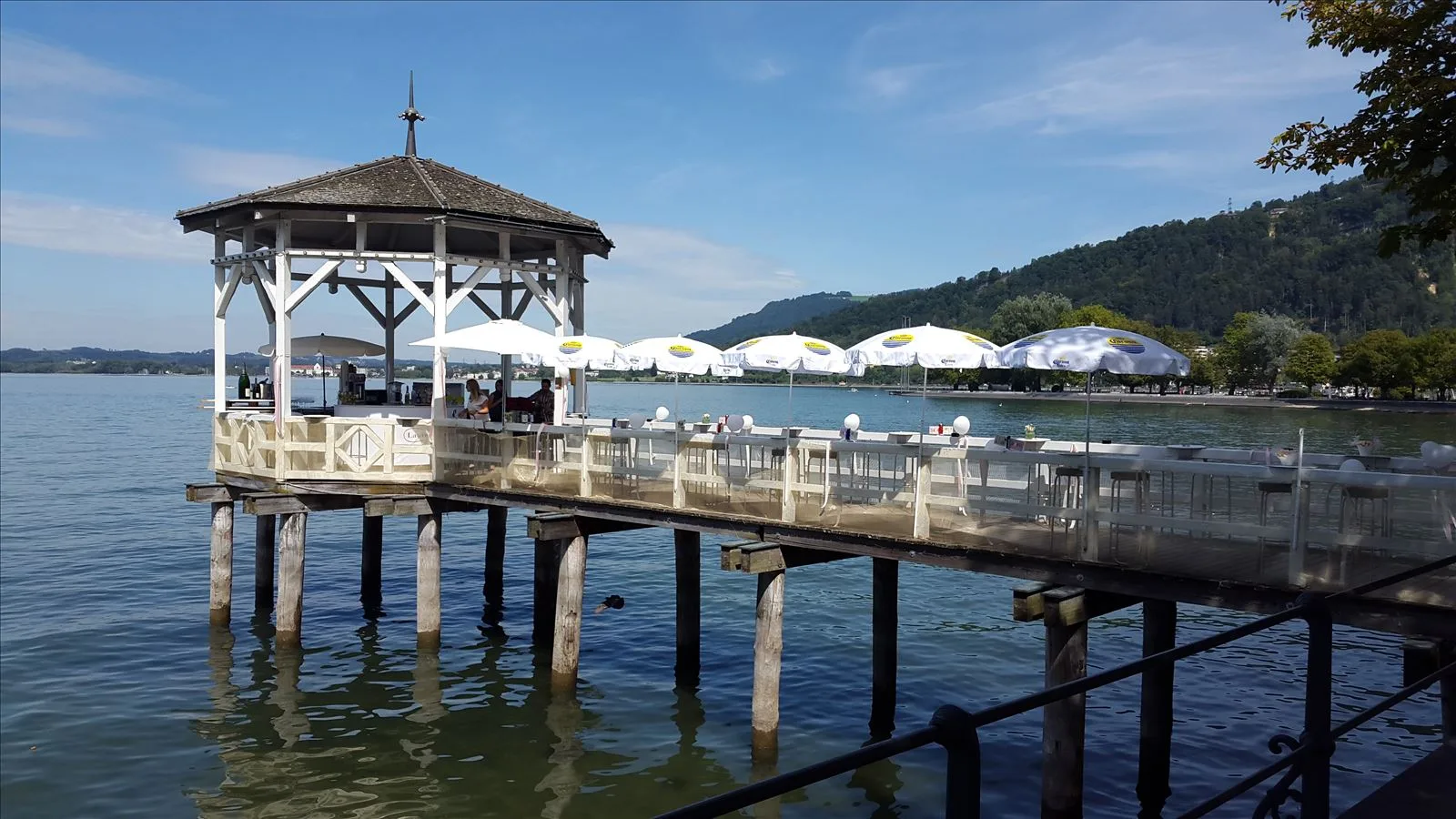 Wooden boat pavilion on the lake