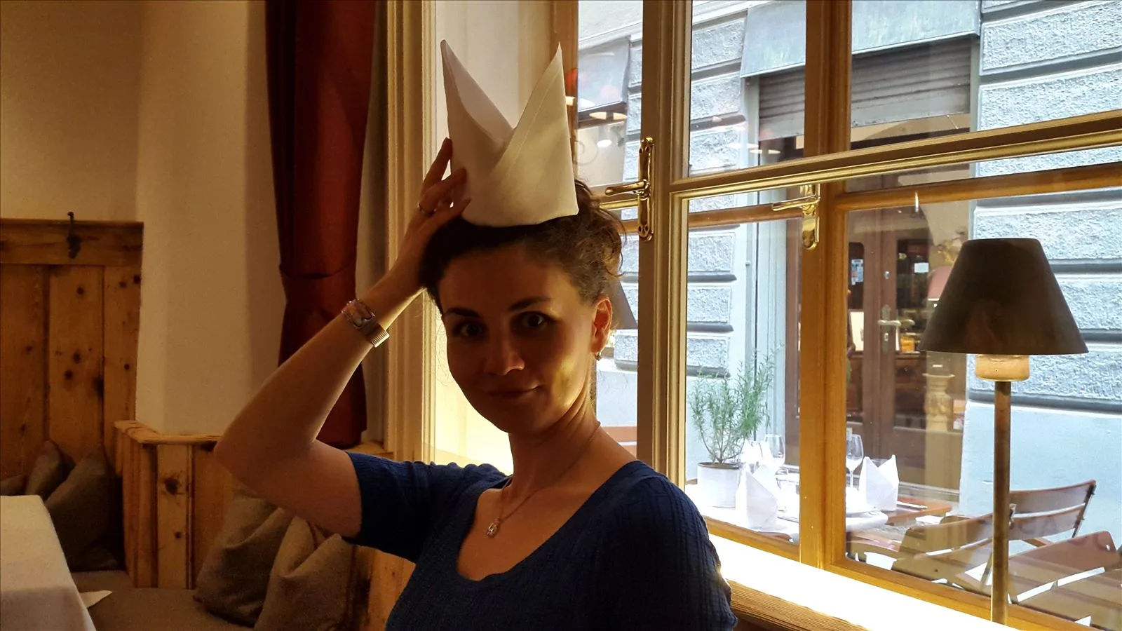 Girl by a window with a Mozart hat