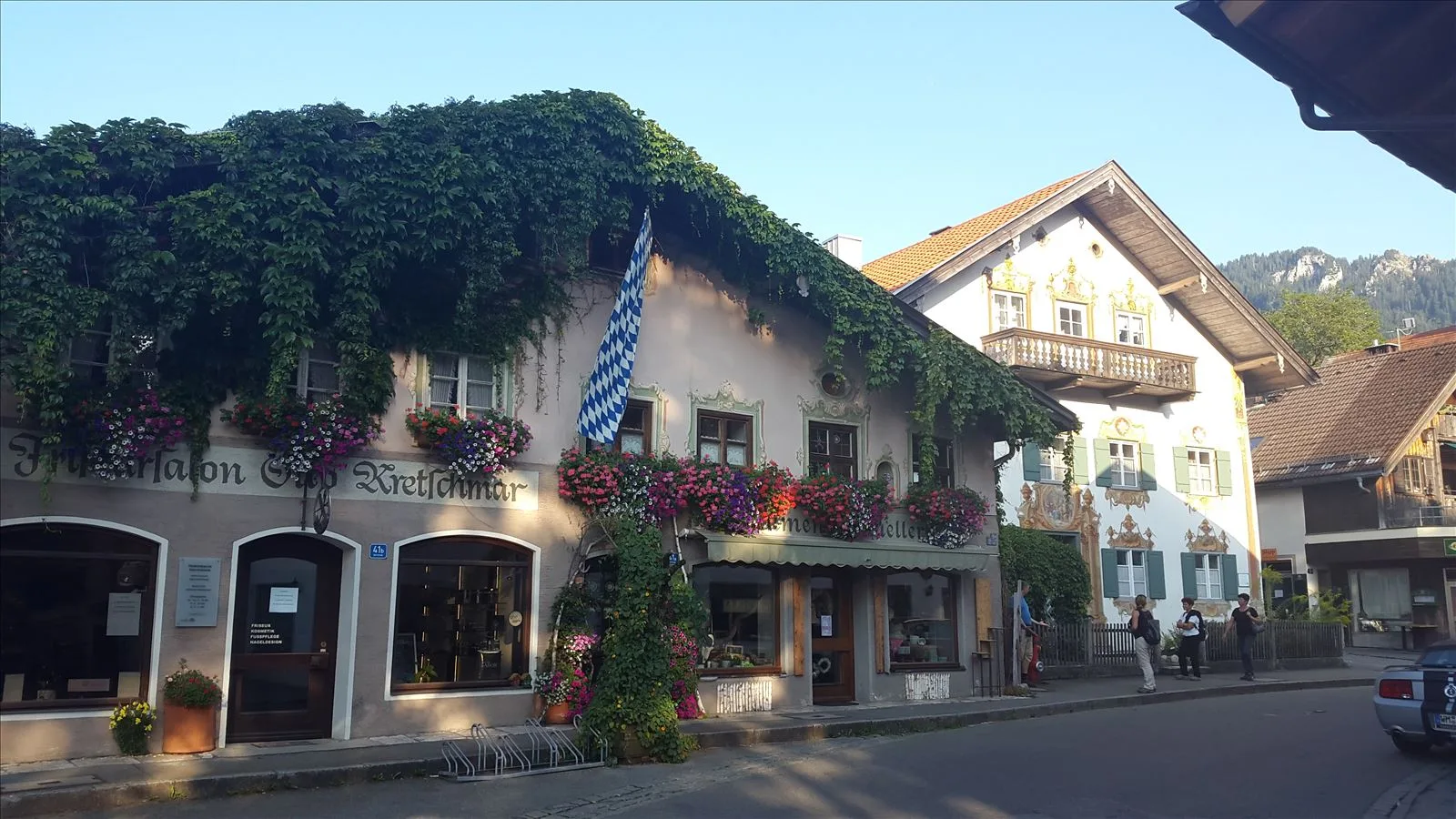 House with flowers and Greek flag in Bavaria