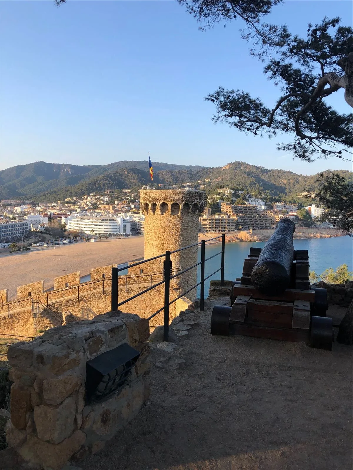 Tossa fortress with beach at sunset