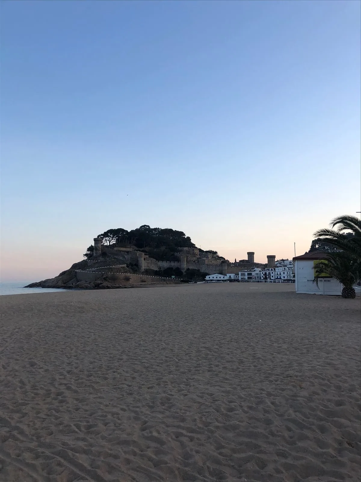Cape and fortress of Tossa at sunset