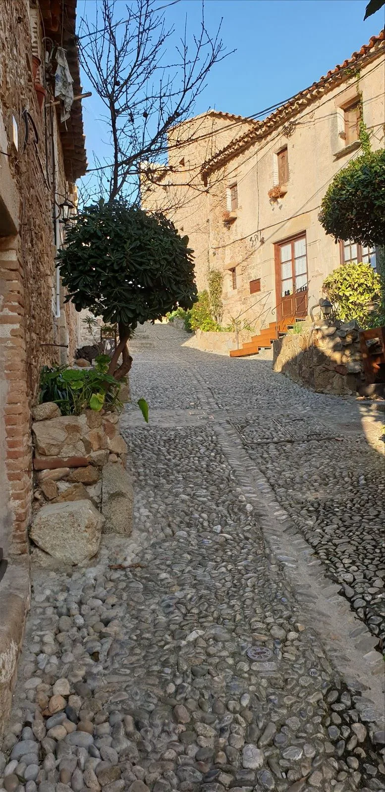 Cobblestone street in the old town of Tossa