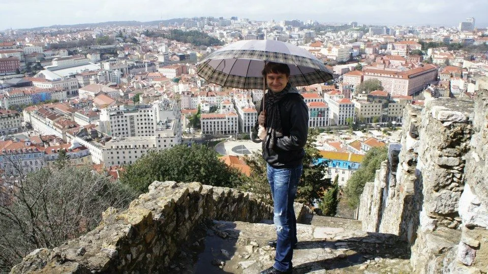 Tourist on the castle walls, panorama of Lisbon