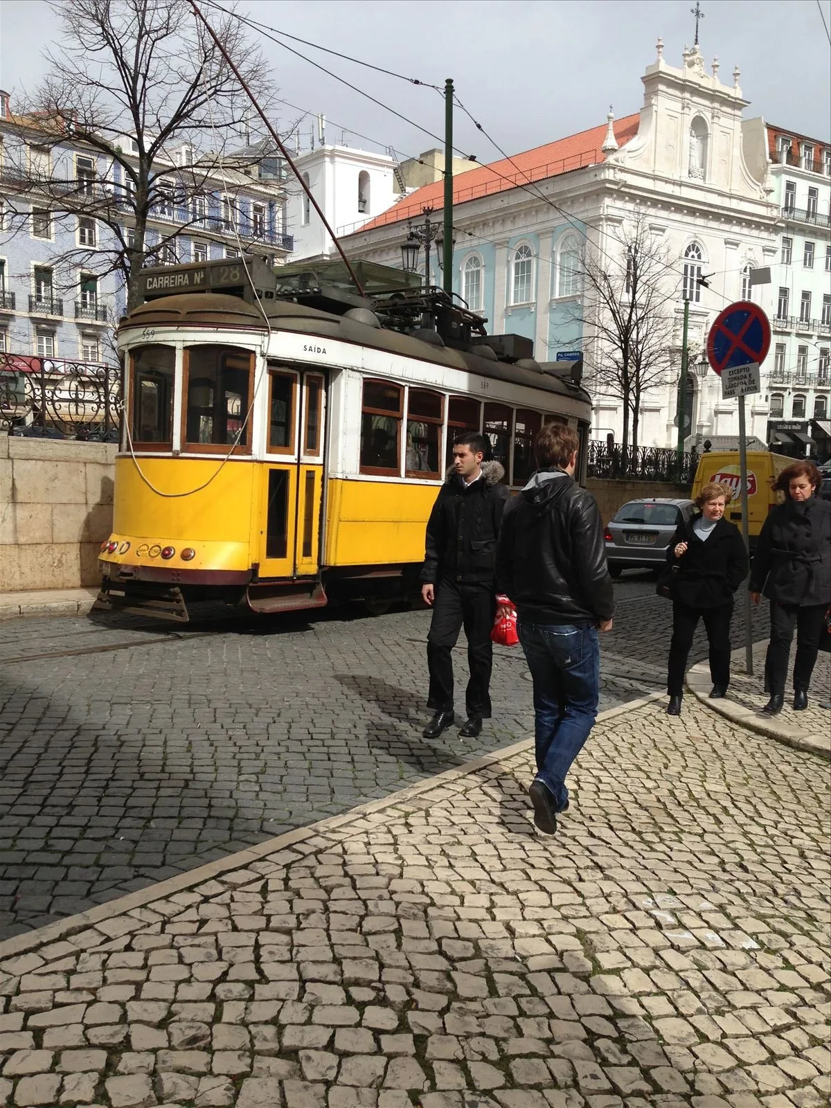 Yellow tram 28 on Lisbon street