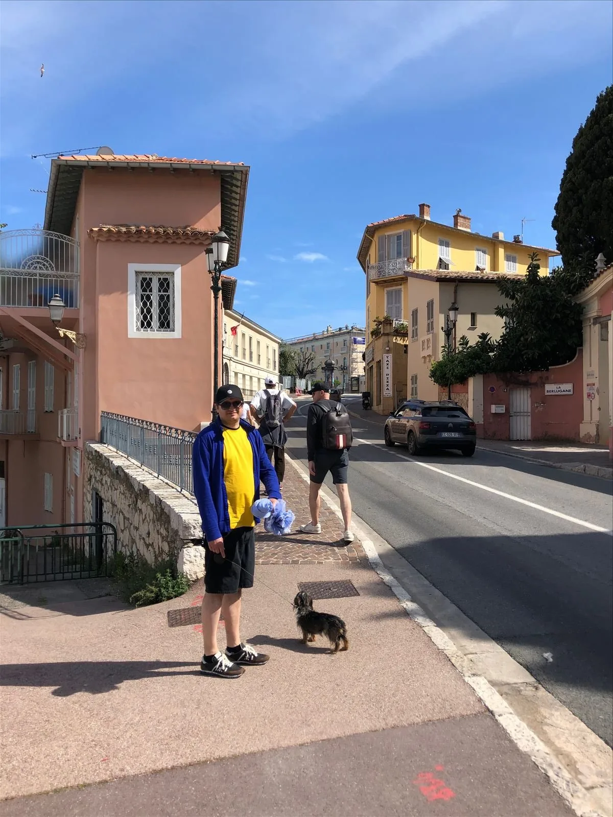 Passersby on Boulevard-sur-Mer street