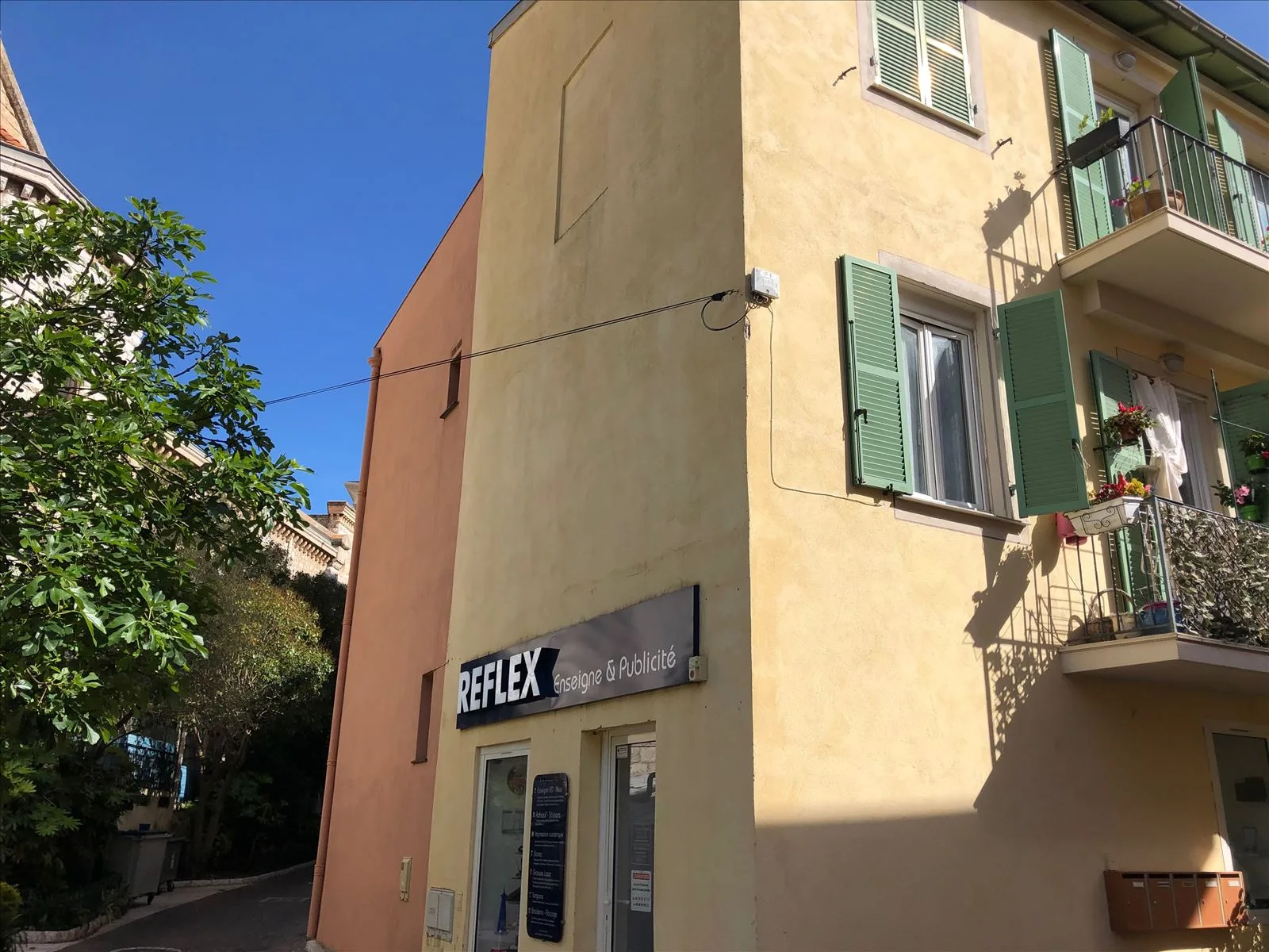 Yellow wall of house in Boulieu-sur-Mer