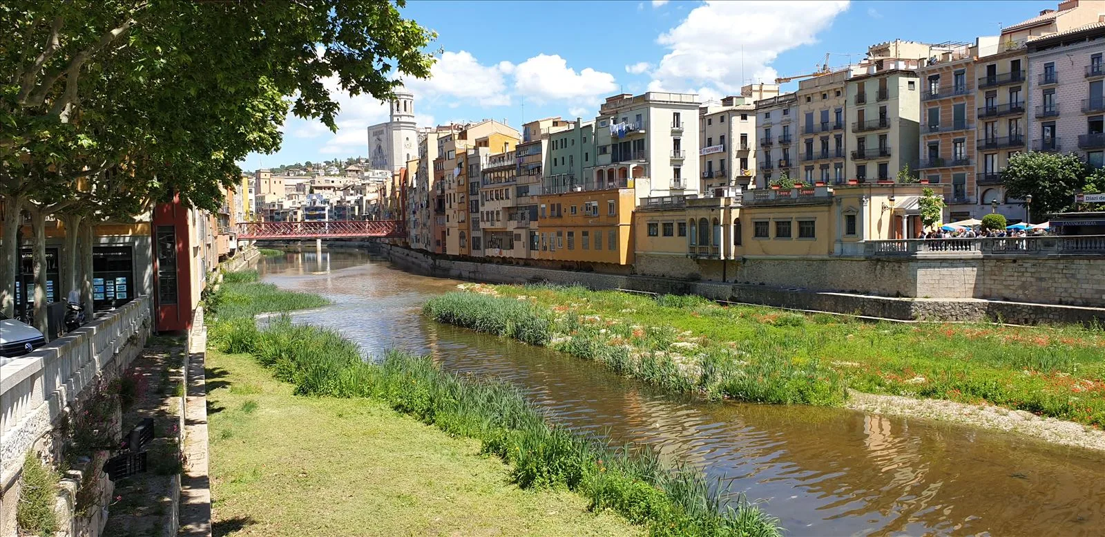 Colorful houses by the Onyar river — close view