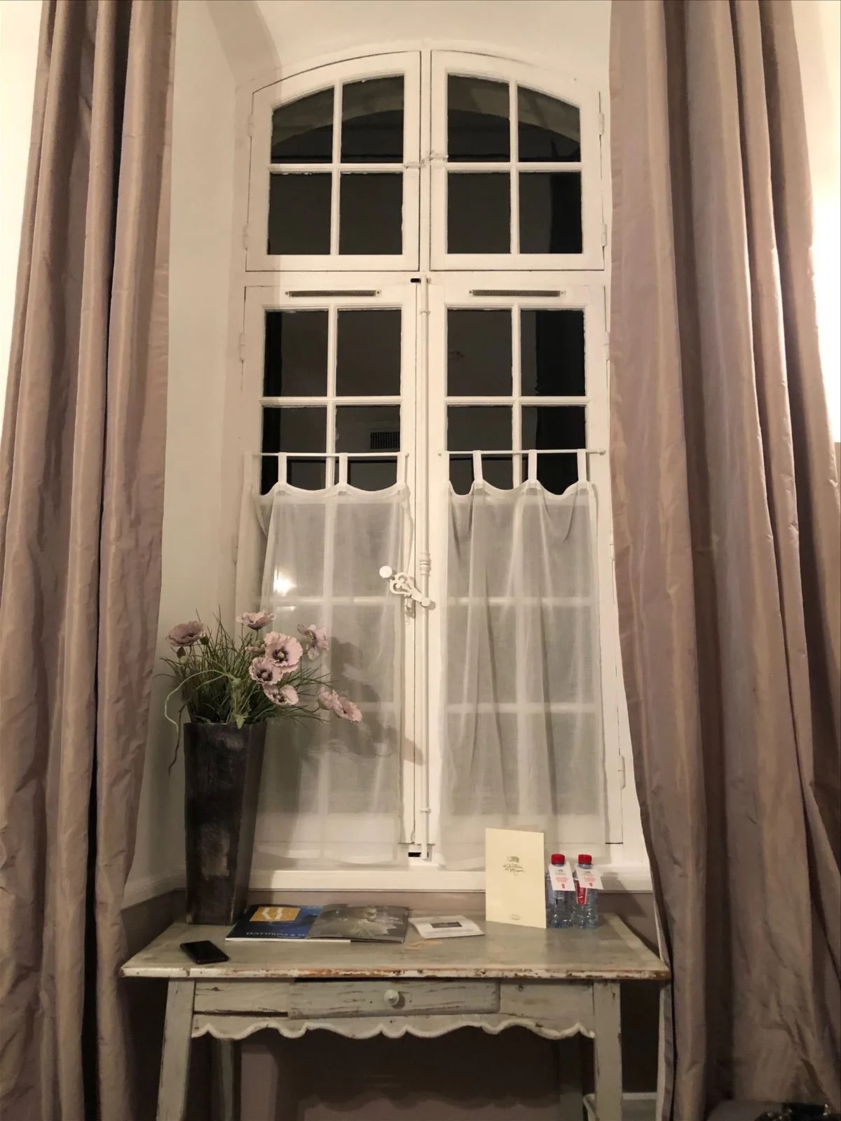 Draped window in a chateau room