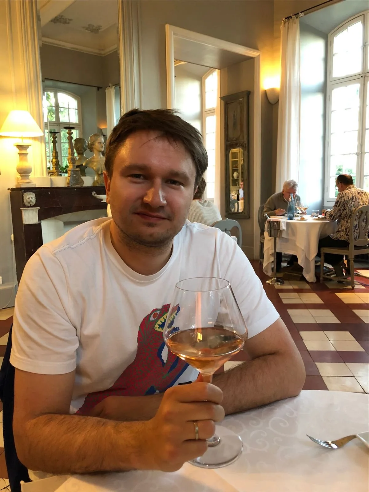 Man having dinner at a château restaurant
