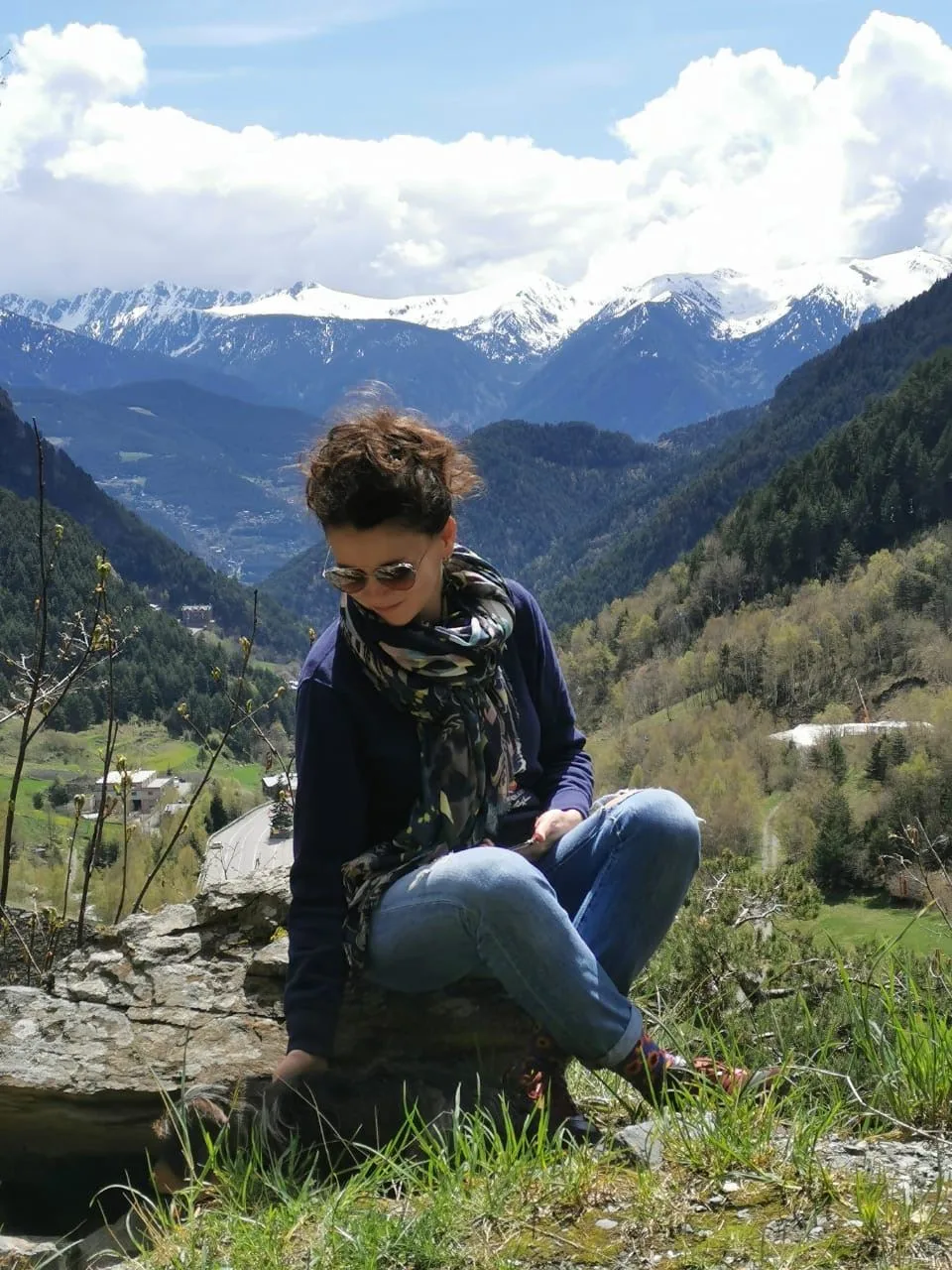 Girl against the backdrop of a mountain valley in Andorra