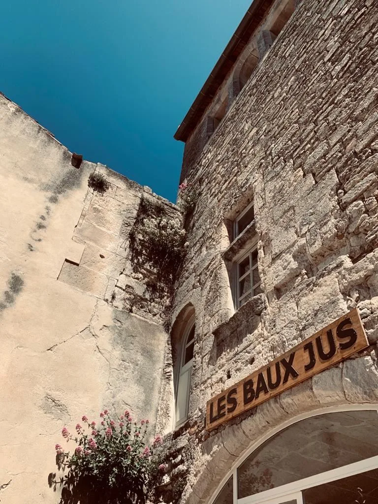 Medieval street with café in Le-Baux