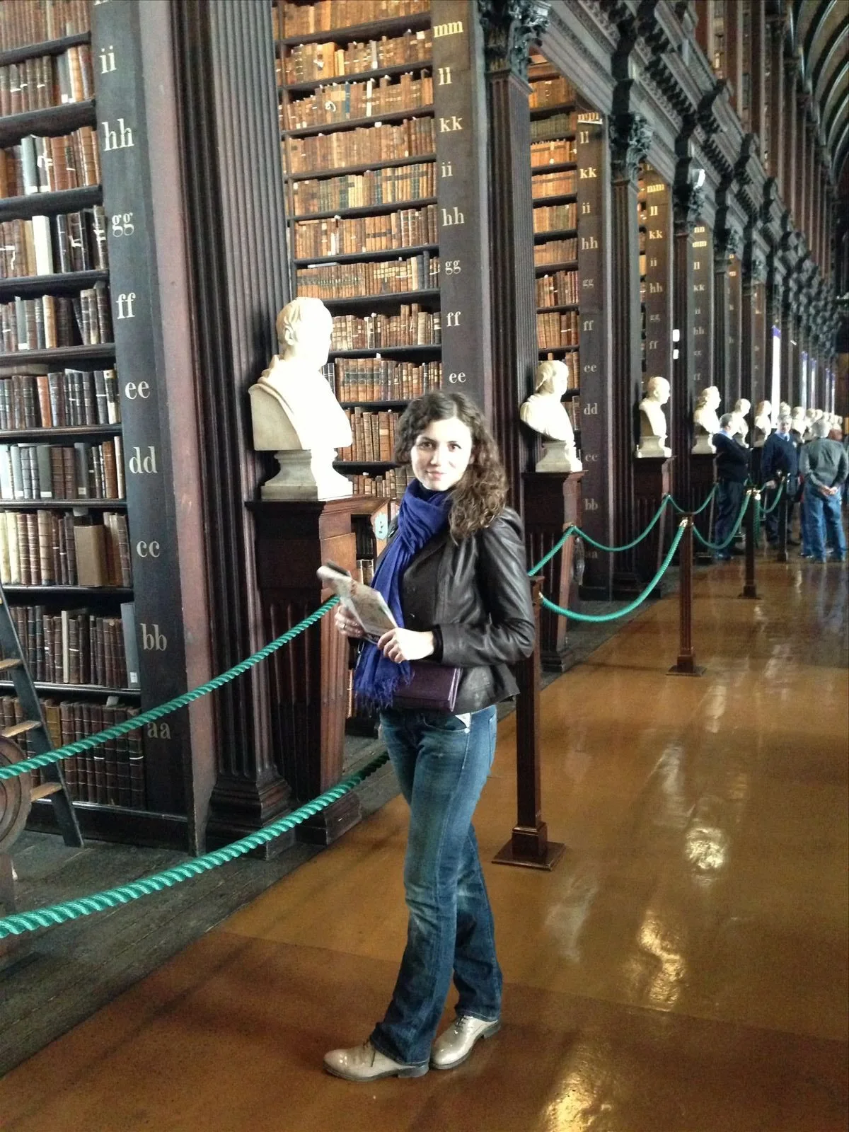 Visitor in Long Room, Trinity College