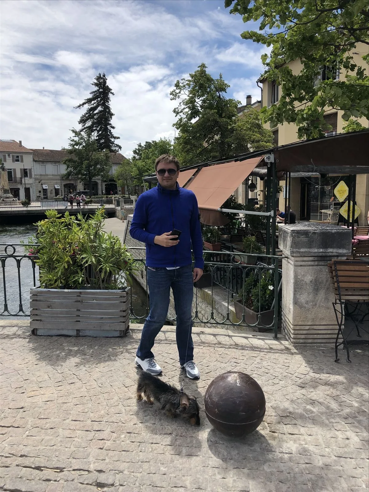 Man at cafe by the canal