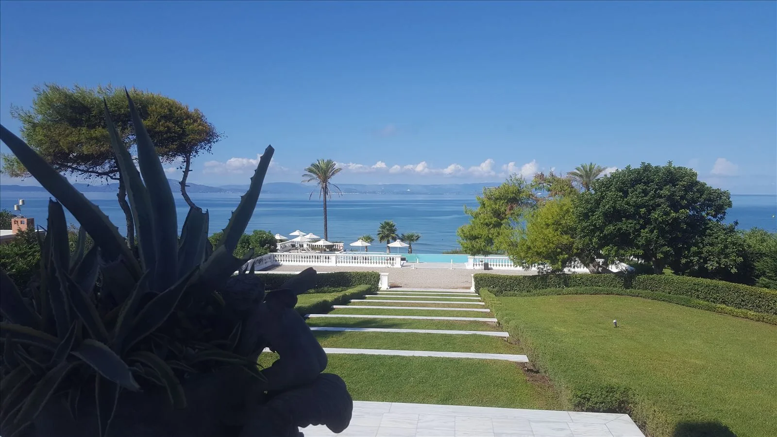 Lawn and sea at Grecotel hotel in Killini