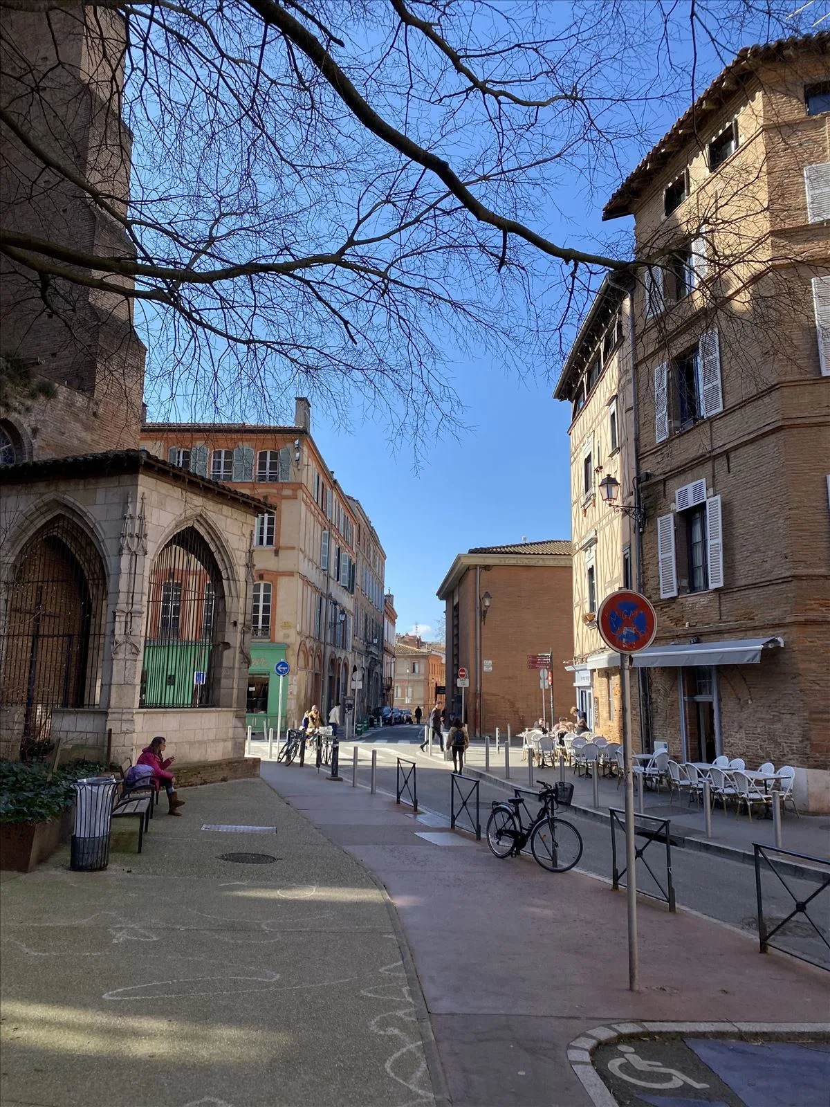 Street with a storefront in downtown Toulouse