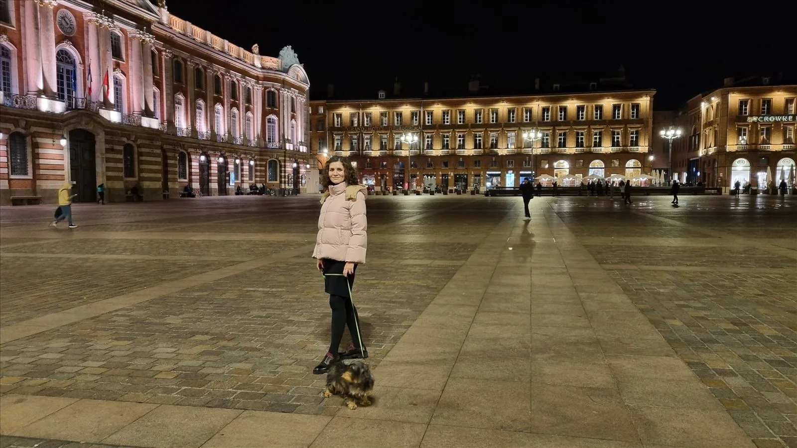 Capitole de Toulouse at night - lonely tourist