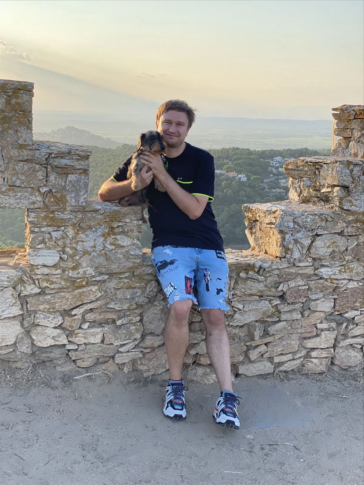 Man at the ruins of Castel de Begur