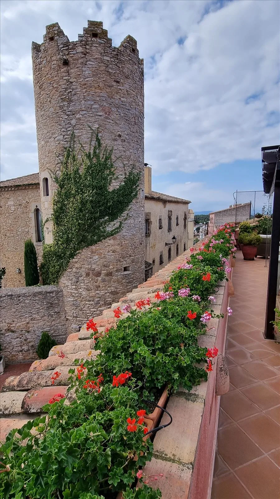 Stone path with flowers in Begur