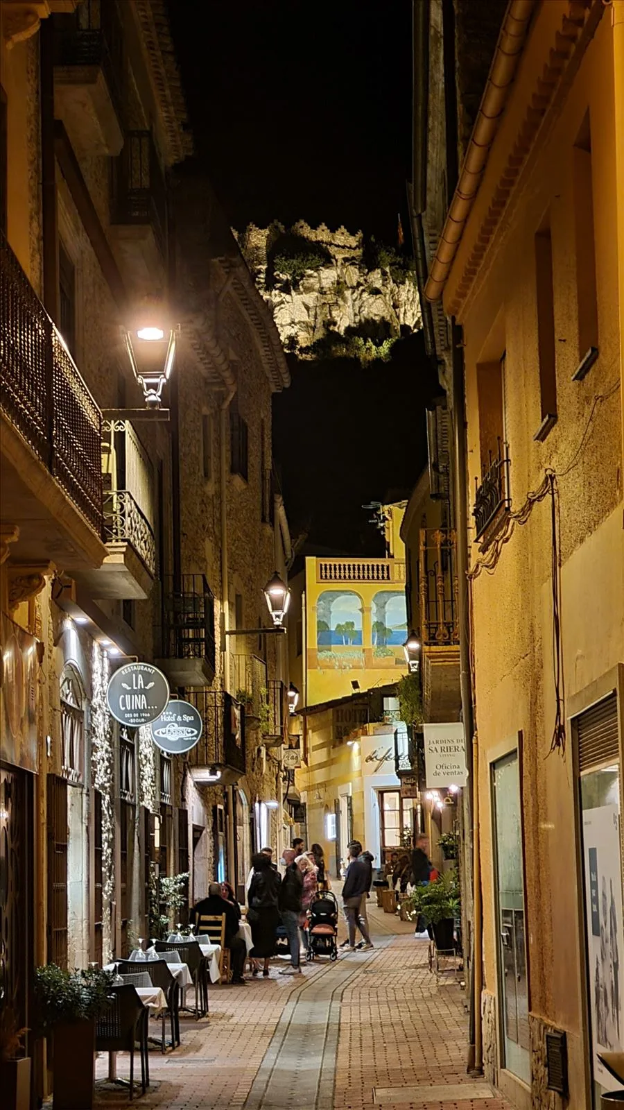 Evening street with lanterns in Begur