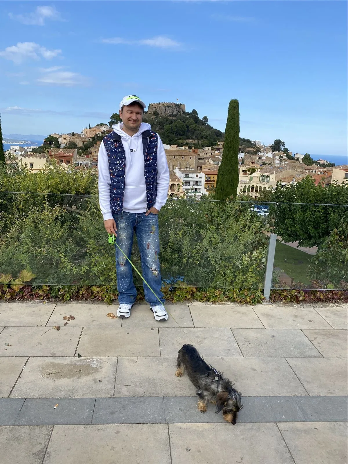 Man at restaurant entrance by water