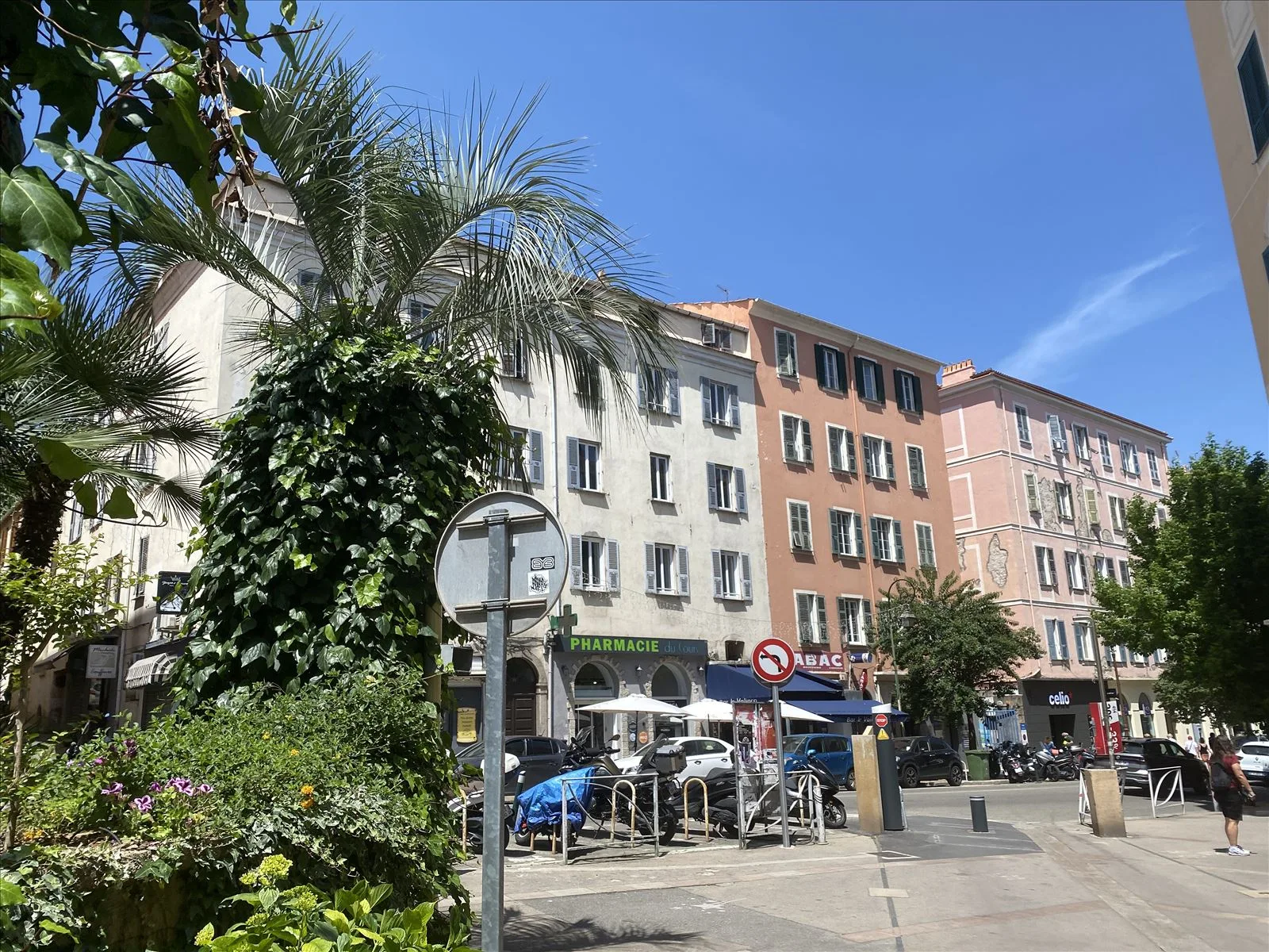 Old Ajaccio street with cafés and umbrellas