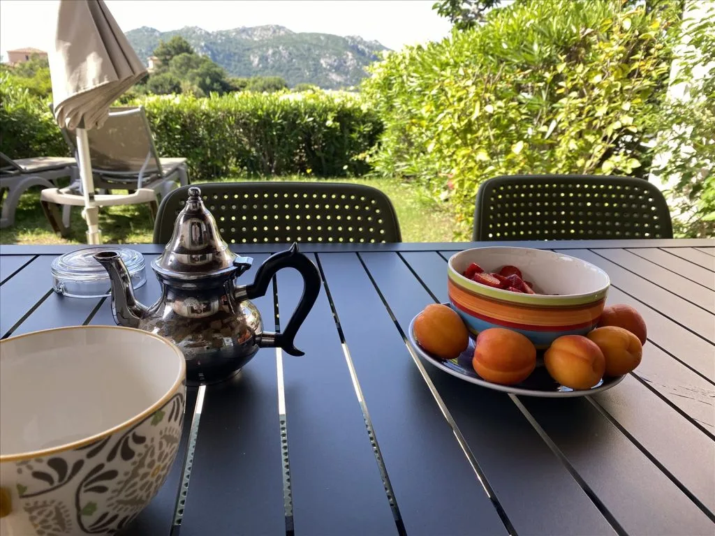 Breakfast on terrace of villa in Corsica