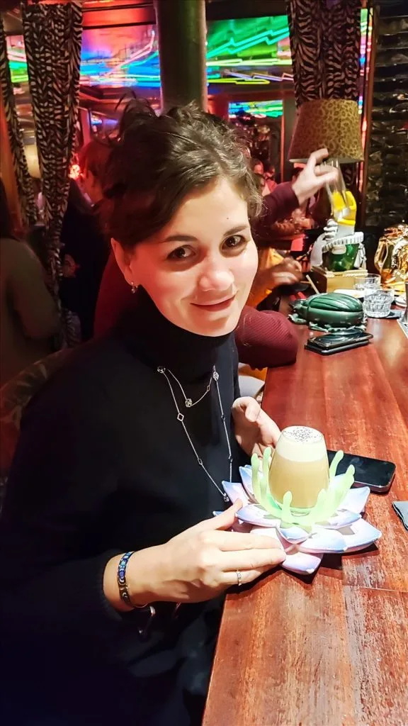 Girl with a drink, close-up