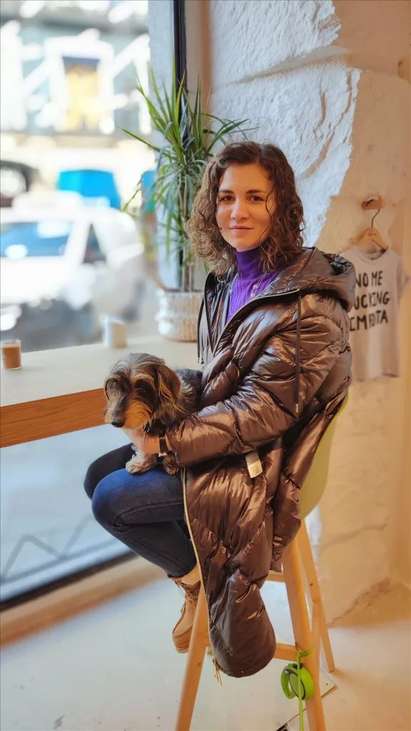 Girl in a puffer jacket on the streets of Madrid