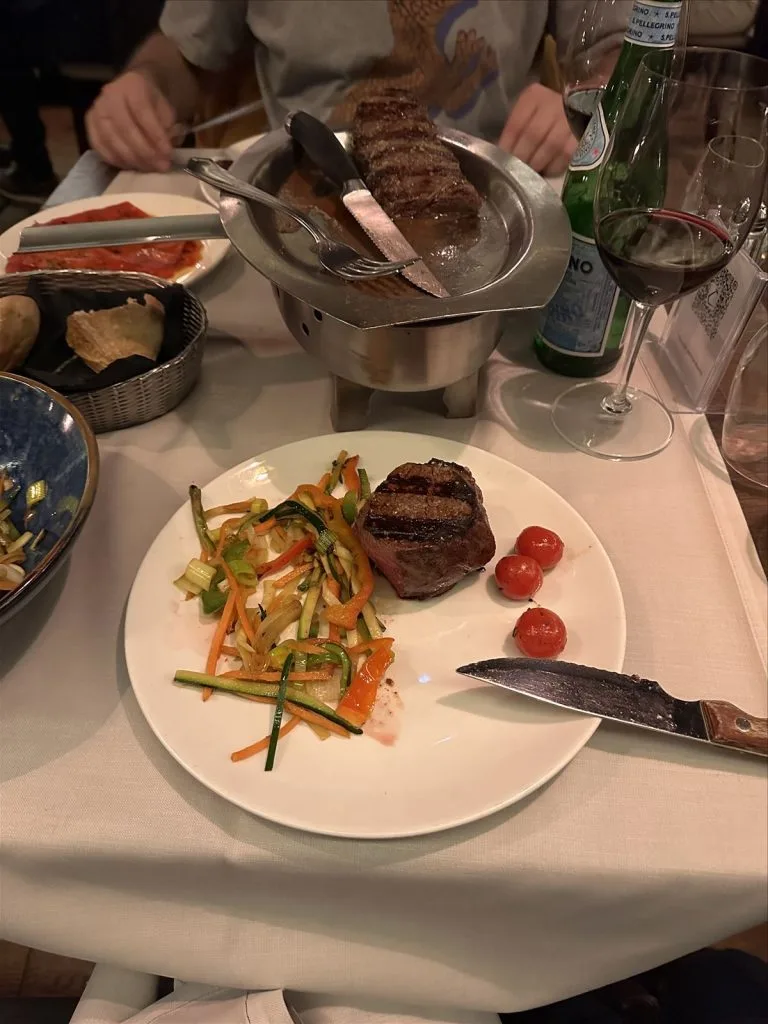 Steak on a wooden board in a restaurant