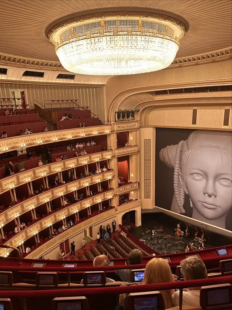 Vienna Opera House hall with a female face sculpture